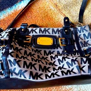 Mk cloth and leather purse